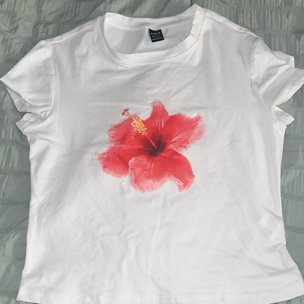 SHEIN: white short sleeve shirt with a flower on the front